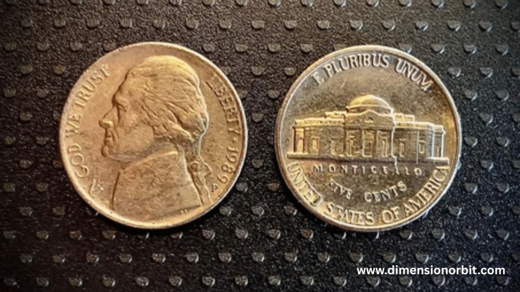 Two U.S. Nickels Stacked Together